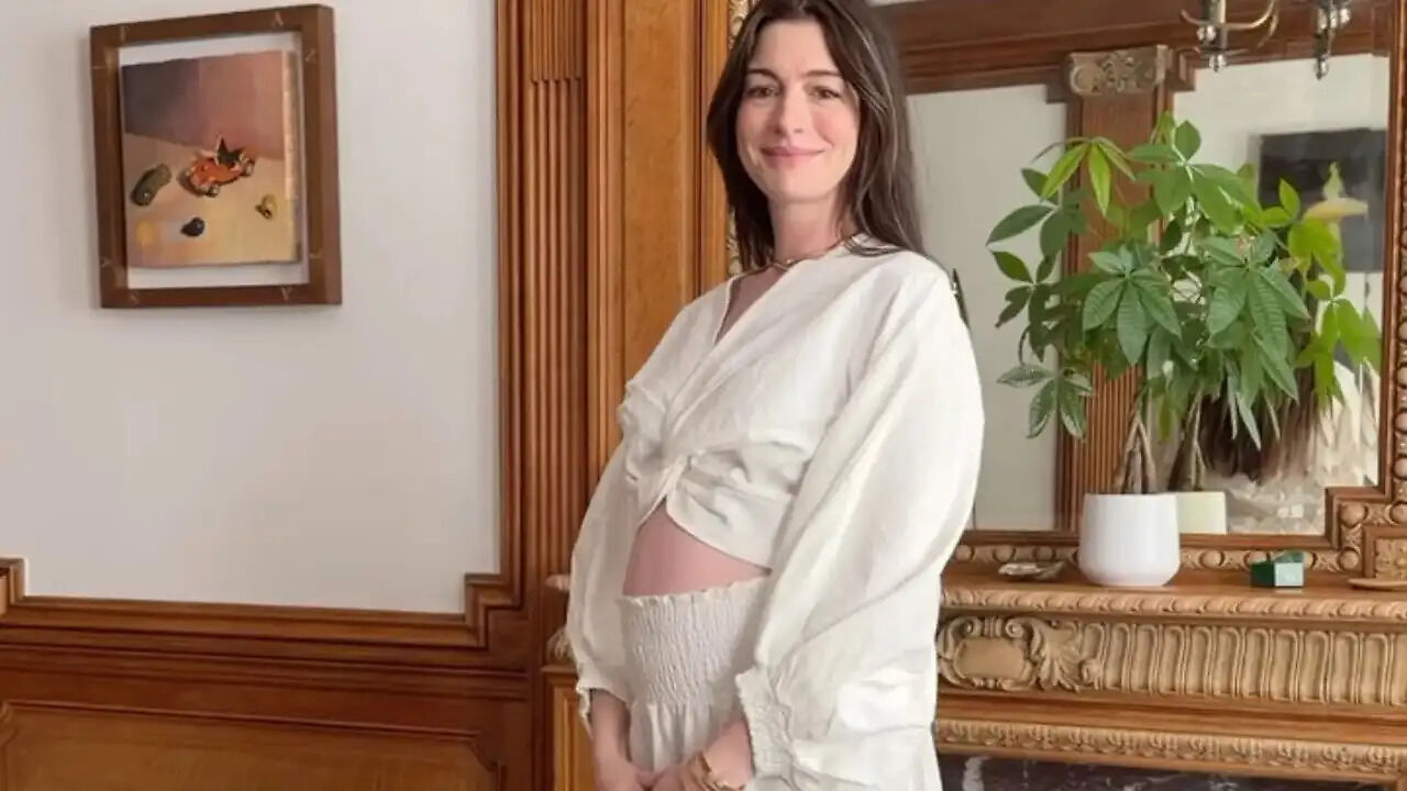 Anne Hathaway emphasizes the importance of family, stating, "We're all
