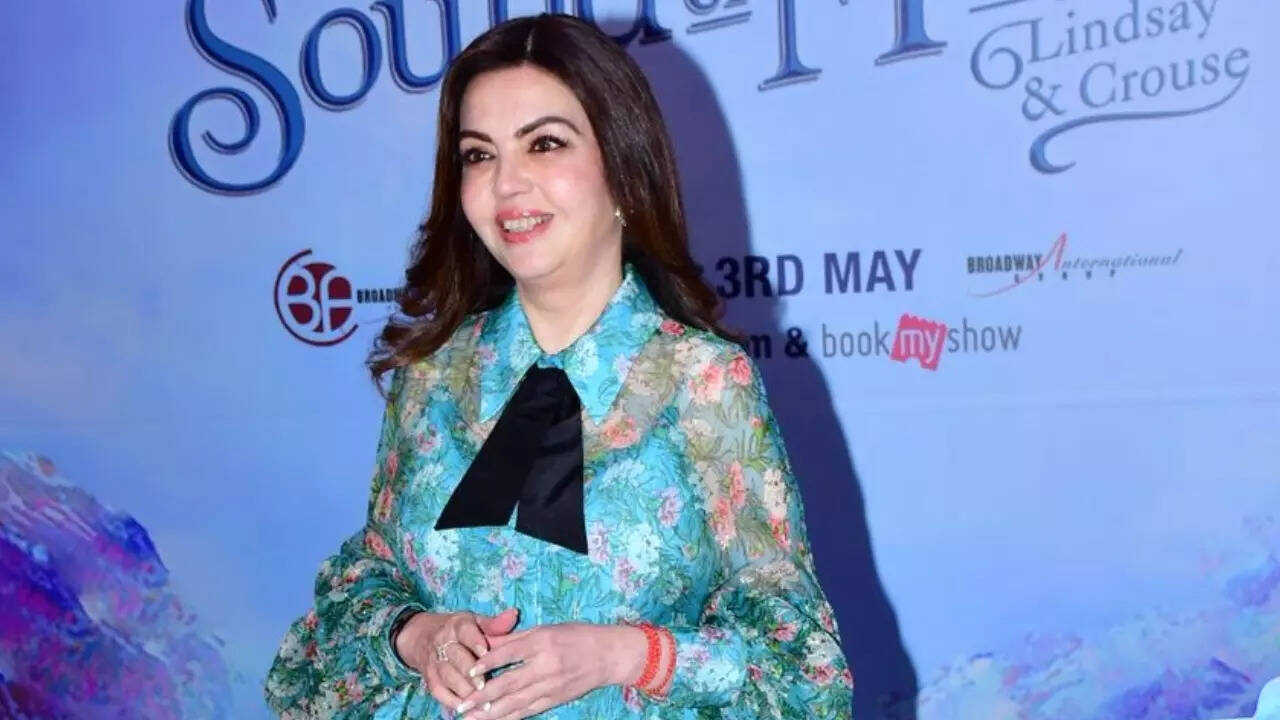 Nita Ambani looks elegant in this blue floral dress.