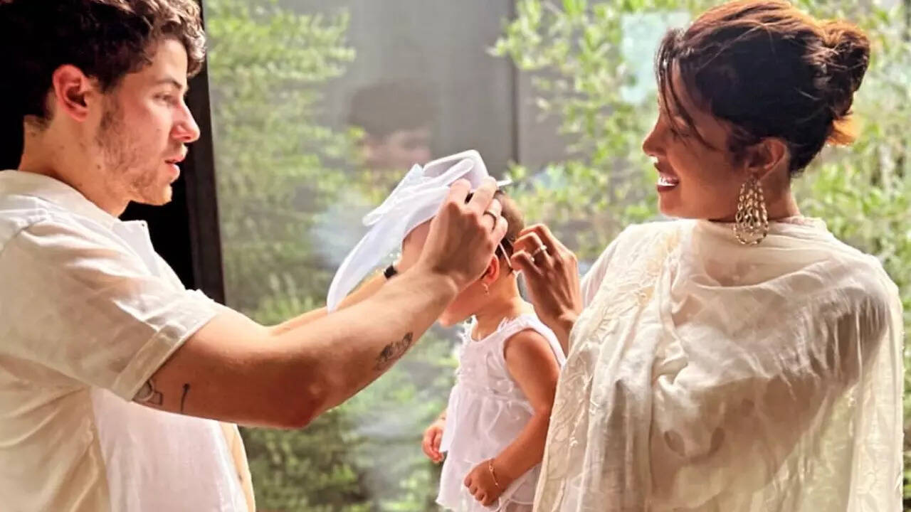 Priyanka Chopra Drops Awwdorable Pic Ft Daddy Nick Jonas Helping Daughter Malti Marie Get Ready