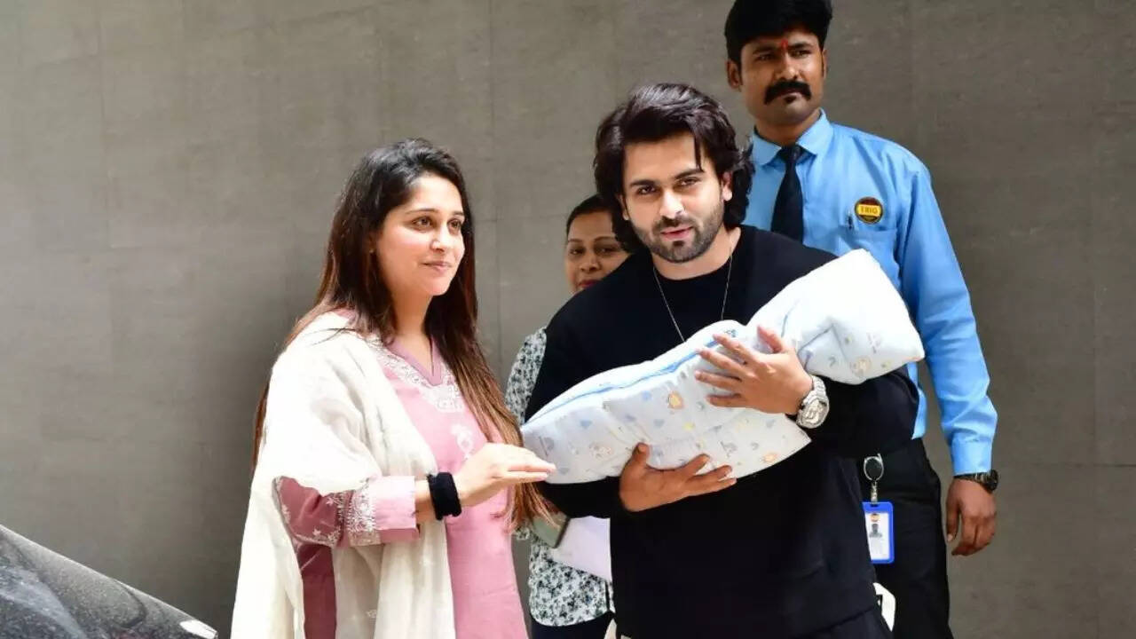 Dipika, Shoaib pose with their son