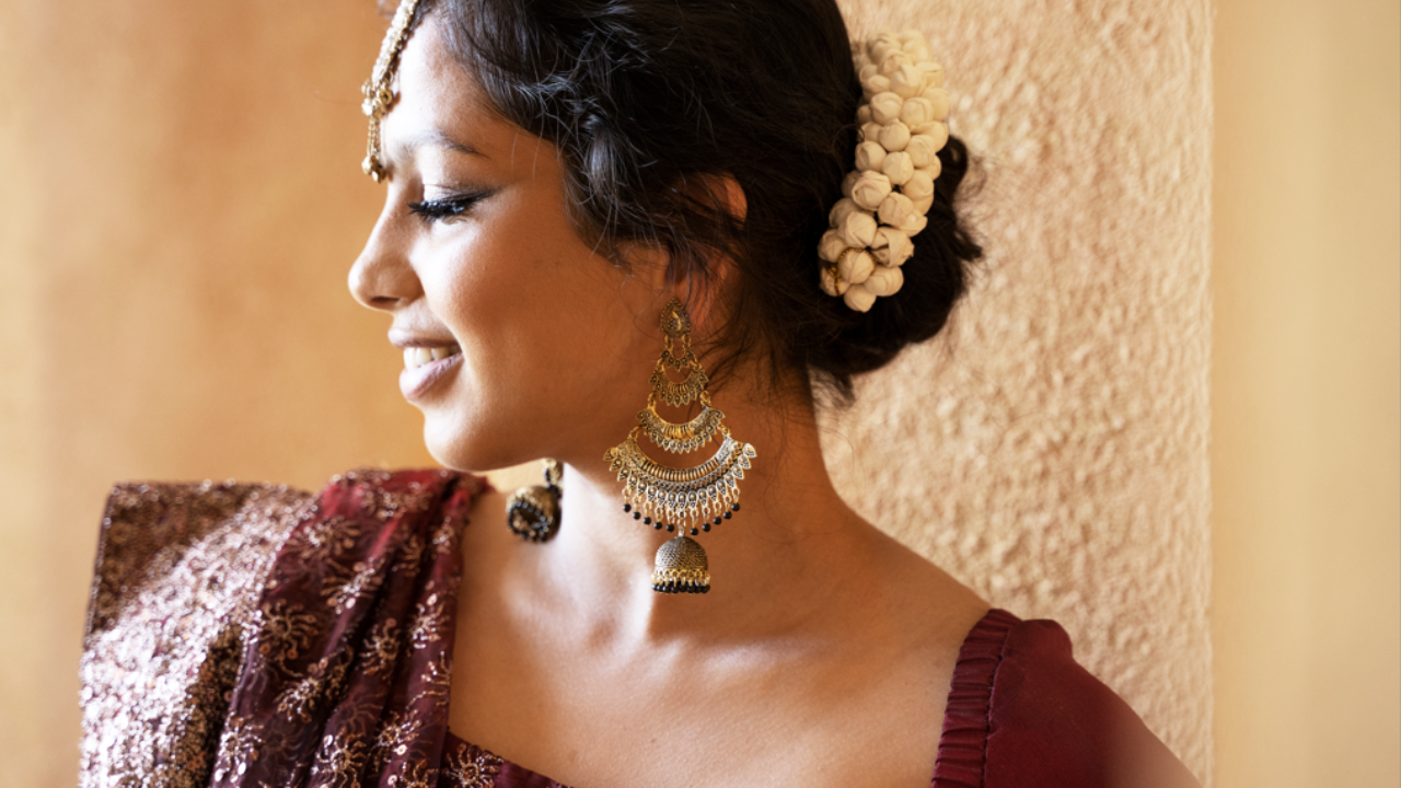 A dermatologist offers advice on how to wear your holiday jhumkas comfortably for extended periods of time. Pic Credit: Freepik