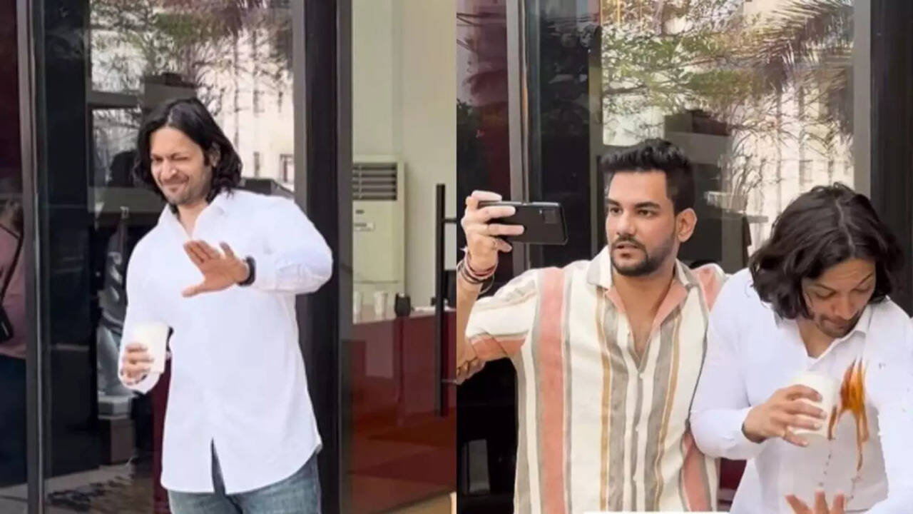 Ali Fazal's Coffee Mishap: White Shirt Stained as Enthusiastic Fan Urges for a Selfie