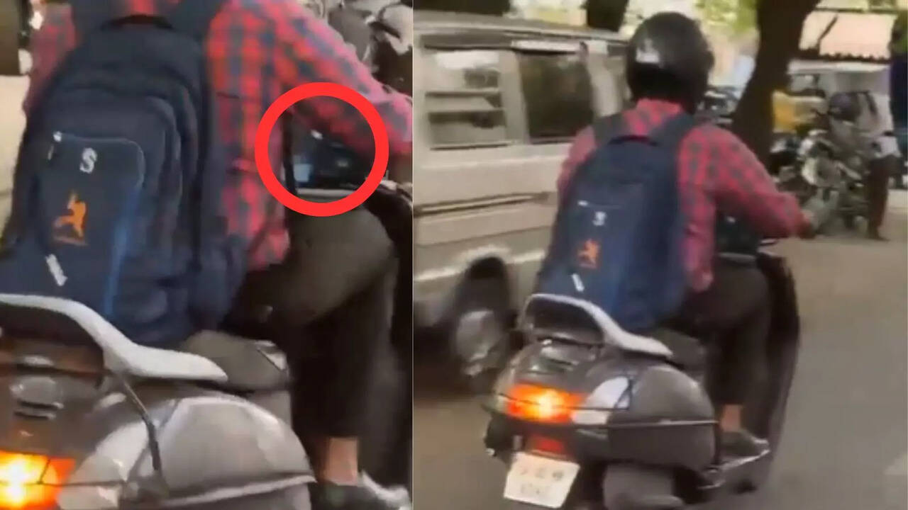 ​Man Spotted On Bengaluru Roads Attending A Meeting On His Laptop While Riding His Scooter, Goes Viral