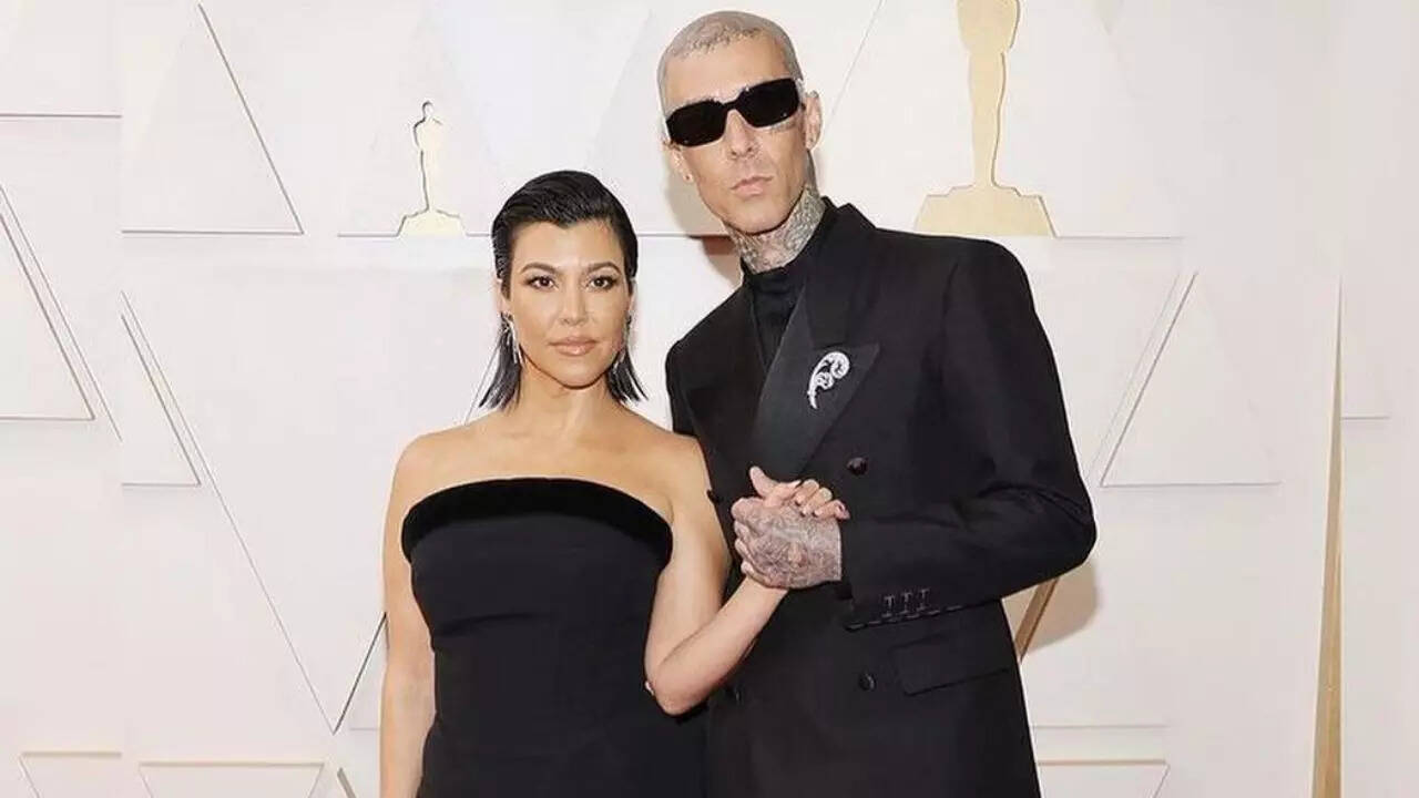 Kourtney Kardashian and Travis Baker at Oscars 2022