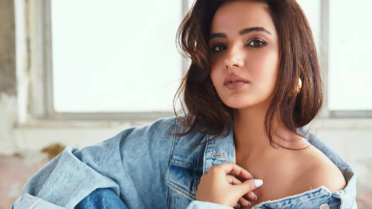 Jasmin Bhasin poses in oversized denim jacket