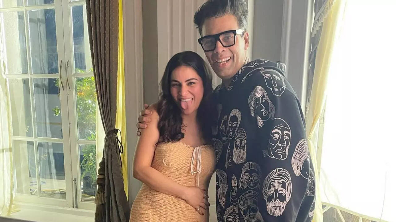 Shraddha Arya poses with Karan Johar