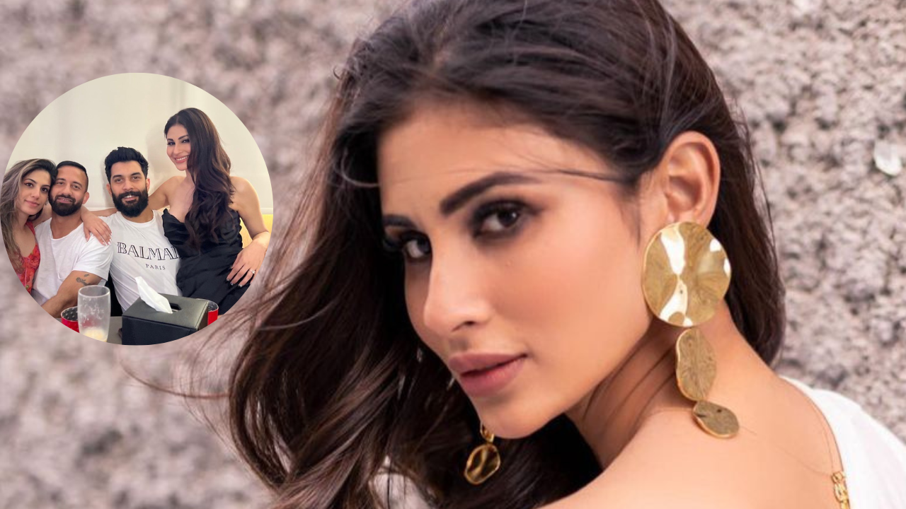 Mouni Roy sits on Suraj Nambiar's lap