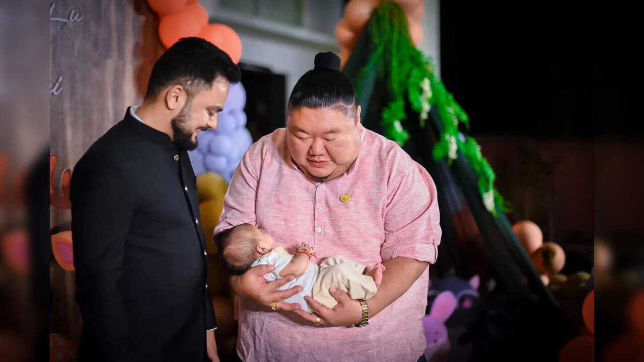 Nagaland Minister Temjen Imna Along took to Twitter account and dropped an ultra adorable picture with a baby and internet is all hearts. Take a look!