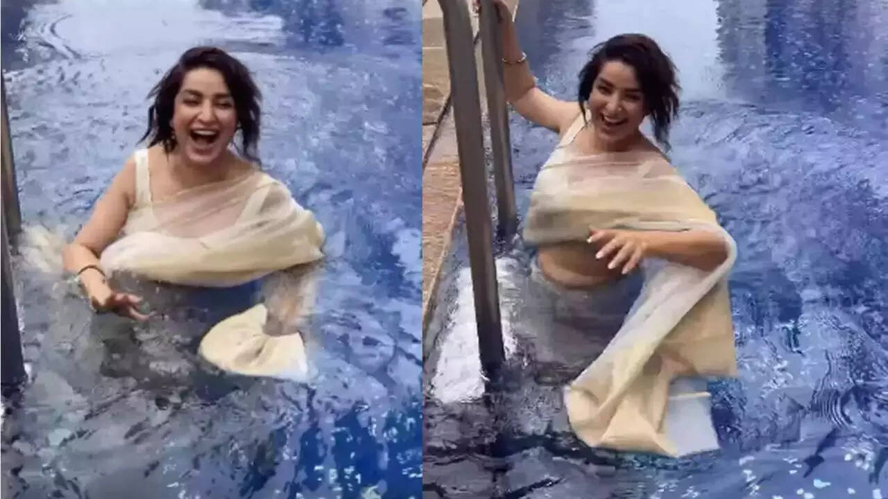 Tisca Chopra steps into the pool wearing a saree