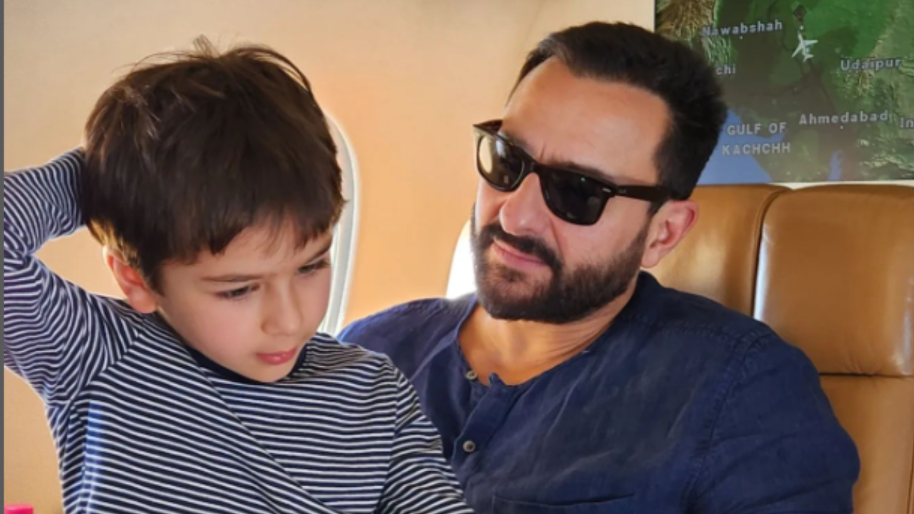 Taimur Ali Khan with father Saif in a plane