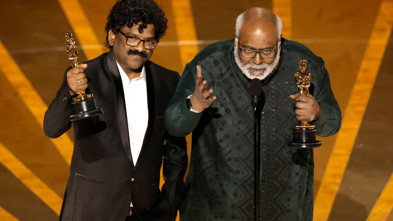 MM Keeravani and Chandrabose accepting award for Naatu Naatu